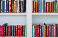 Multicolored book covers on shelf